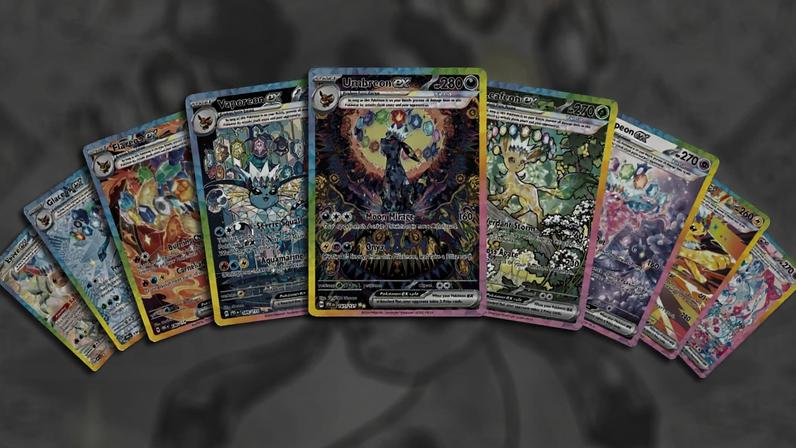 Prismatic Evolution cards all fanned out pretty.