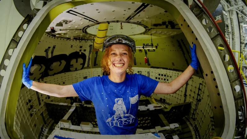 Rebekah Tolatovicz, a mechanical technician lead for the Arctic Slope Regional Corporation, or ASRC Federal, supporting the Orion spacecraft’s main contractor Lockheed Martin, works inside the Artemis III Orion crew module in the Operations and Checkout Building at NASA’s Kennedy Space Center in Florida.