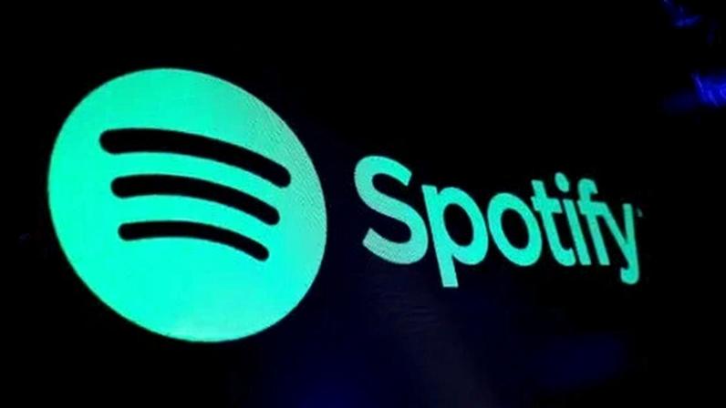 Tela exibindo o logotipo do Spotify no pregão da Bolsa de Valores de Nova York