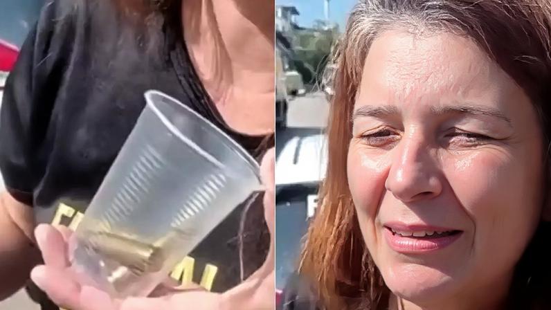 Irmã de comerciante pega capsula de bala disparada por PM com copo plástico e chora: 'Mataram meu irmão'