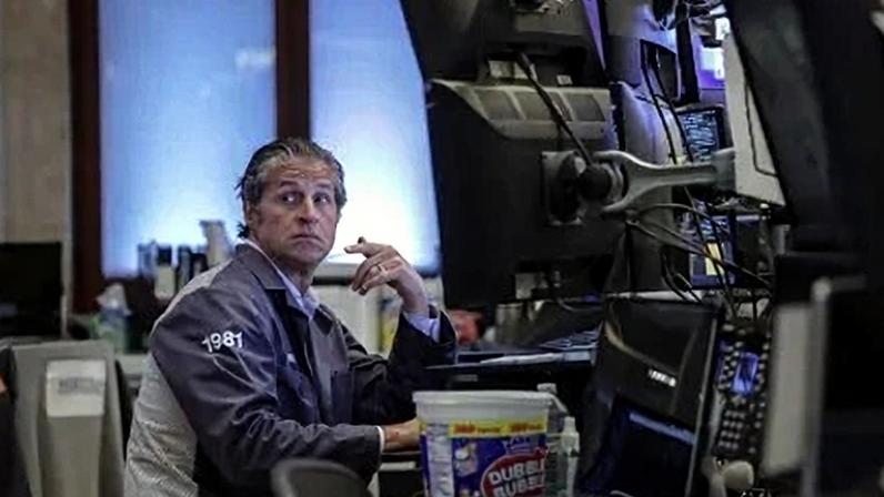 Operador na bolsa de Nova York em 23 de abril de 2026