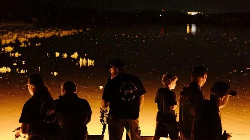 A nighttime snakehead fishing excursion led by Loriann Bowman Bates, left, and Bill Bates, center, on the Potomac River this month.