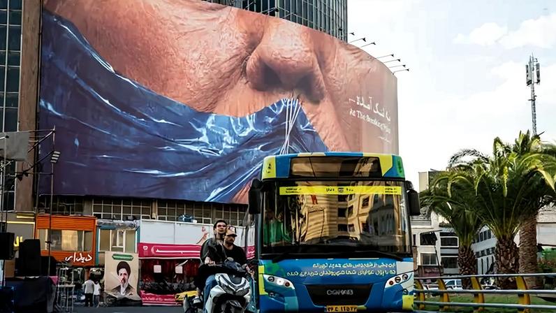 A billboard in Tehran depicts the closure of the Strait of Hormuz.