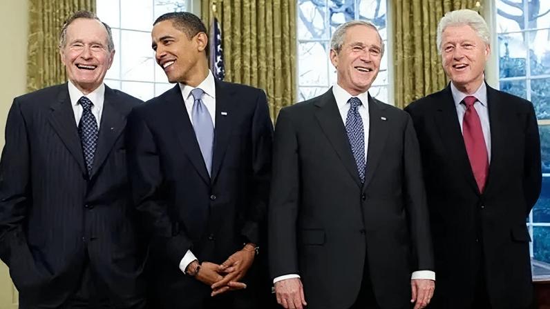 George HW Bush (L-R), Barack Obama, George W Bush and Bill Clinton