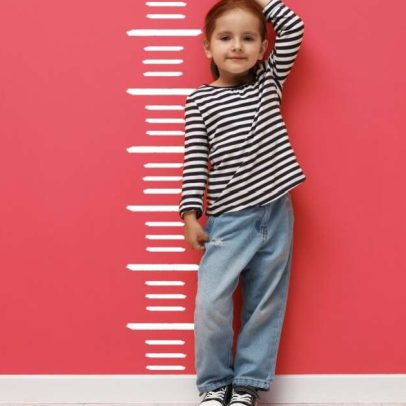 Fatores além da genética influenciam o crescimento infantil