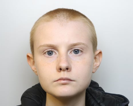 Mug shot of Alina Burns, a young woman with cropped hair