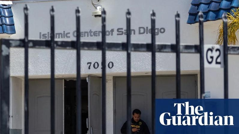 San Diego police officers stand guard a day after a shooting at the Islamic Center of San Diego, California, on 19 May.