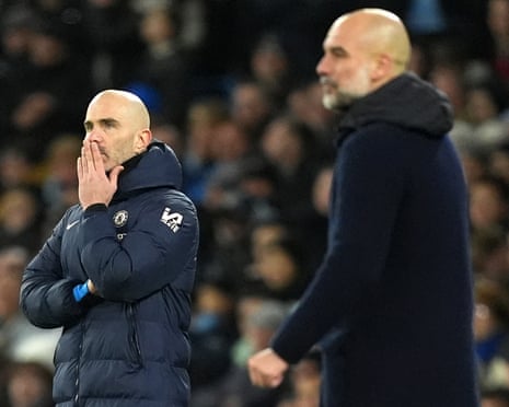 Enzo Maresca, then the Chelsea manager, stands on the touchline with Pep Guardiola