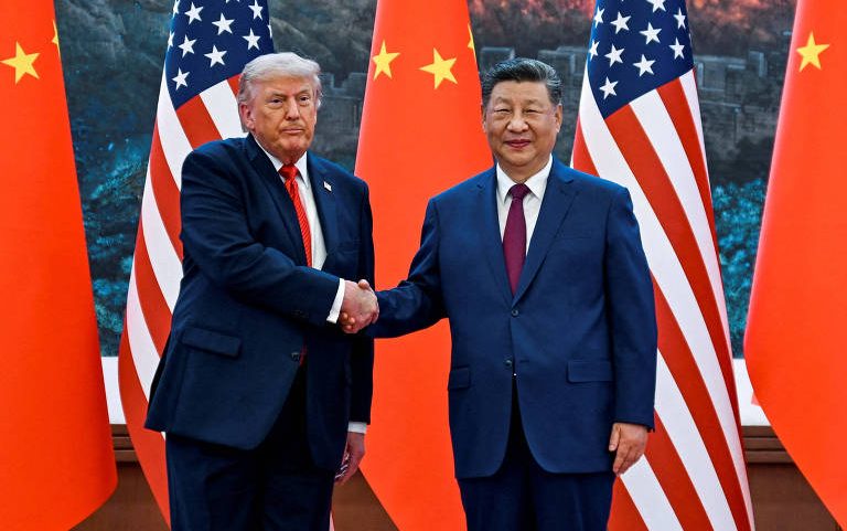 O presidente dos EUA, Donald Trump e o dirigente da China, Xi Jinping durante encontro em Pequim