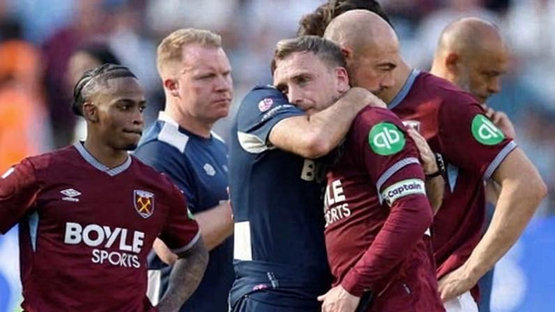 West Ham's Jarrod Bowen is consoled by a member of the club’s coaching staff after relegation was confirmed.