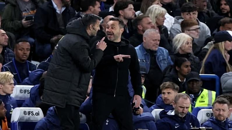 Roberto De Zerbi has an animated conversation with the fourth official, Andy Madley, during Tottenham’s defeat at Chelsea.