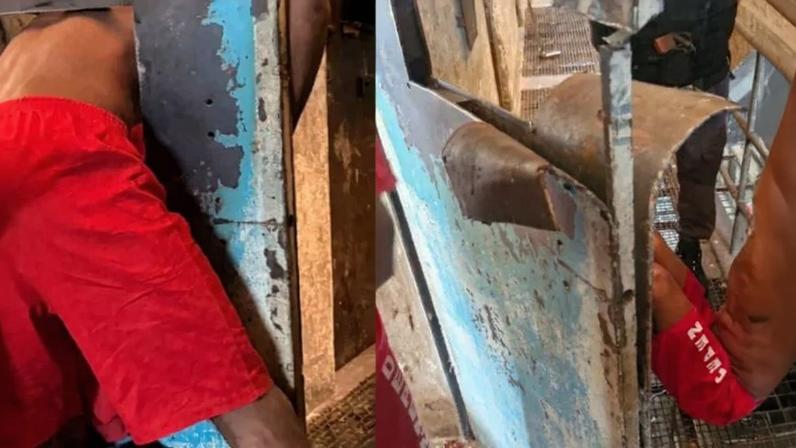 O preso ficou preso ao tentar pegar um objeto pessoal que havia caído do lado de fora da cela - (crédito: Corpo de Bombeiros/Reprodução)