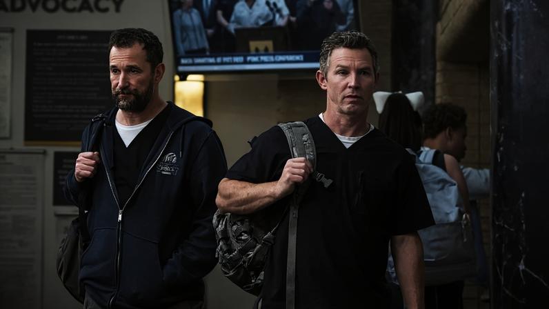 Robby and Abbott head out the pedestrian entrance to find a packed waiting room. (Warrick Page/MAX)