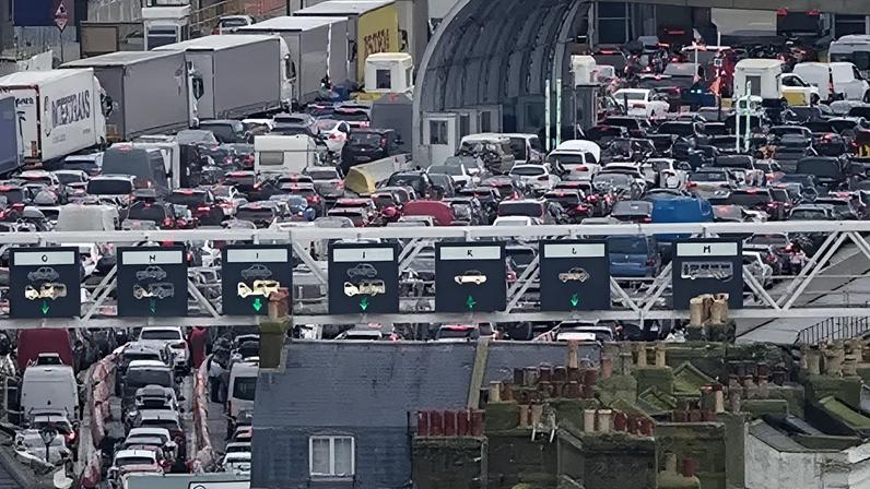 Cars queue at the border while waiting to board ferries at the Port of Dover in December 2025