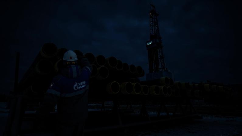 A worker inspects pipes at a drilling rig on the Gazprom PJSC Chayandinskoye oil, gas and condensate field in the Lensk district of the Sakha Republic, Russia.