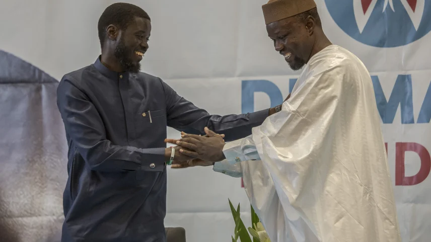 Senegal President Bassirou Diomaye Faye and Ousmane Sonko greet each other in Dakar, Senegal, on Friday, March 15, 2024.