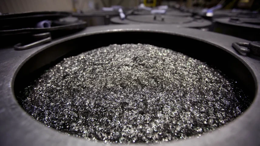 Rare earths magnets in a barrel prior to being crushed into powder at a factory in Tianjin, China.