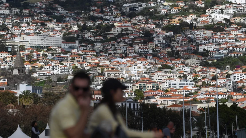 Residential apartment buildings on a hillside in Funchal, Portugal.