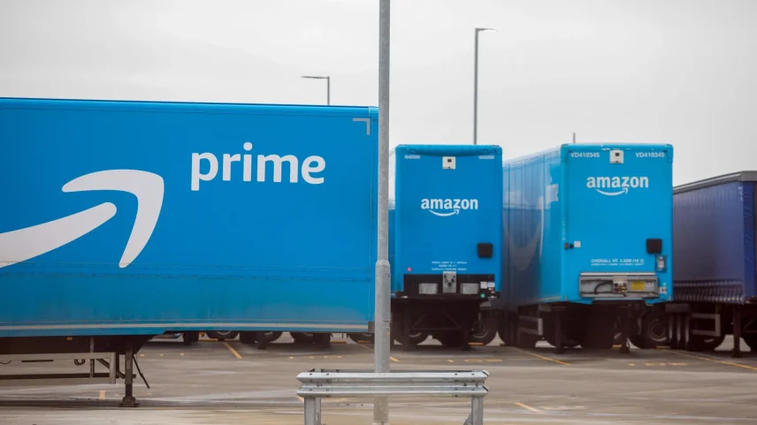 Amazon.com Inc. Prime branded trucks at one of the company’s fulfilment centers.