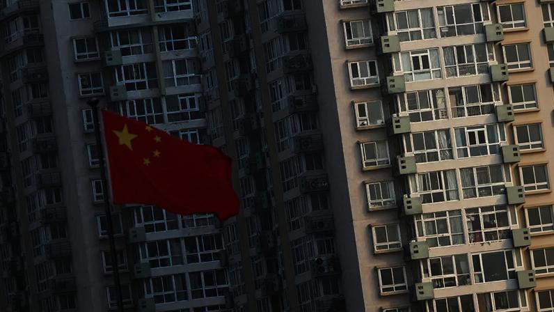Bandeira da China perto de prédios residenciais em Pequim 09/03/2025. REUTERS/Tingshu Wang/File Photo