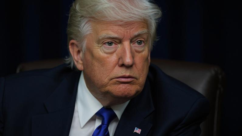 FILE PHOTO: U.S. President Donald Trump looks on as he signs executive orders and proclamations in the Oval Office at the White House, in Washington, D.C., U.S., May 5, 2025. REUTERS/Leah Millis/File Photo