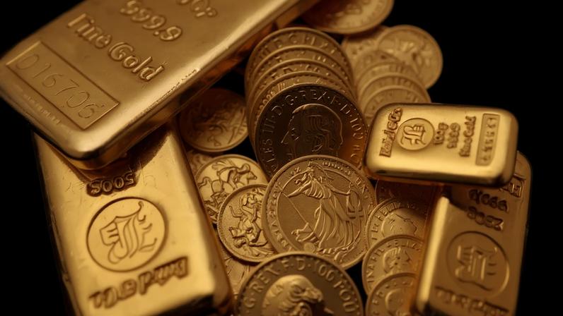 Barras e moedas de ouro do Reino Unido são exibidas em Hatton Garden, Londres, Reino Unido - 08/10/2025 (Foto: REUTERS/Hiba Kola)