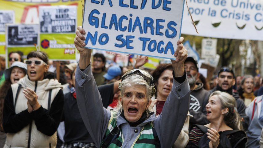 A woman marches toward the National Congress as lawmakers debate a reform to the Glaciers Law in Buenos Aires, Argentina, on April 8, 2026. The reform, promoted by Argentine President Javier Milei, seeks to allow provinces to define glacier protection zones to permit the expansion of mining activity. (Photo by Matias Baglietto/NurPhoto)NO USE FRANCE
