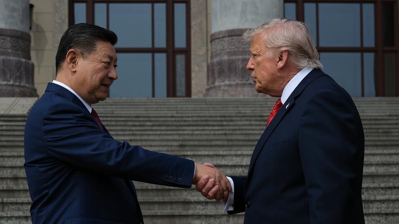 Presidentes da China, Xi Jinping, e dos EUA, Donald Trump 14 de maio de 2026 Kenny Holston/Pool via REUTERS