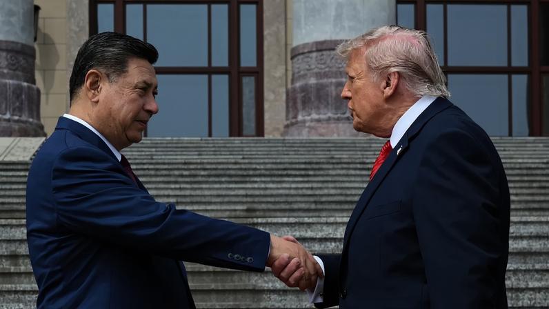 Presidentes da China, Xi Jinping, e dos EUA, Donald Trump 14 de maio de 2026 Kenny Holston/Pool via REUTERS