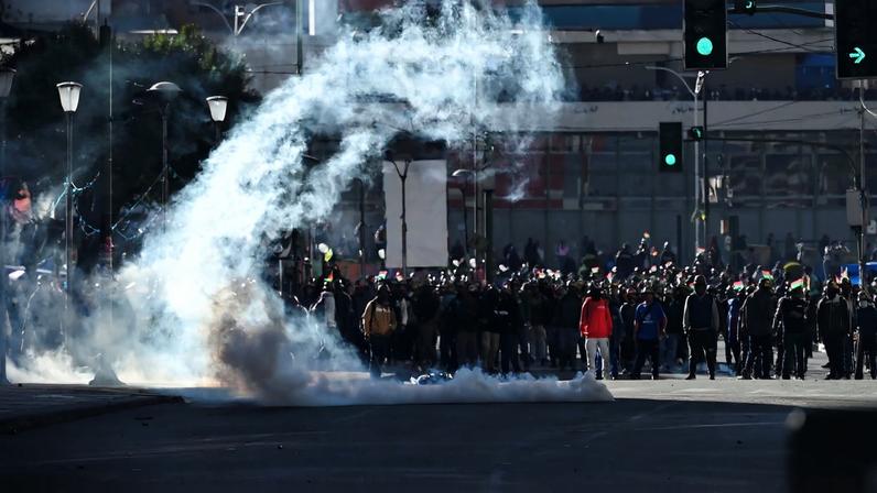 Demonstrators from mining unions face police forces as they protest against President Rodrigo Paz's government amid an ongoing economic and fuel crisis, in La Paz, Bolivia, May 14, 2026. REUTERS/Claudia Morales