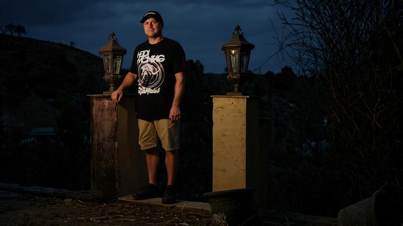 Spencer Pratt stands in the ruins of his home, destroyed in the Palisades fire in early 2025. He is now a Los Angeles mayoral contender.