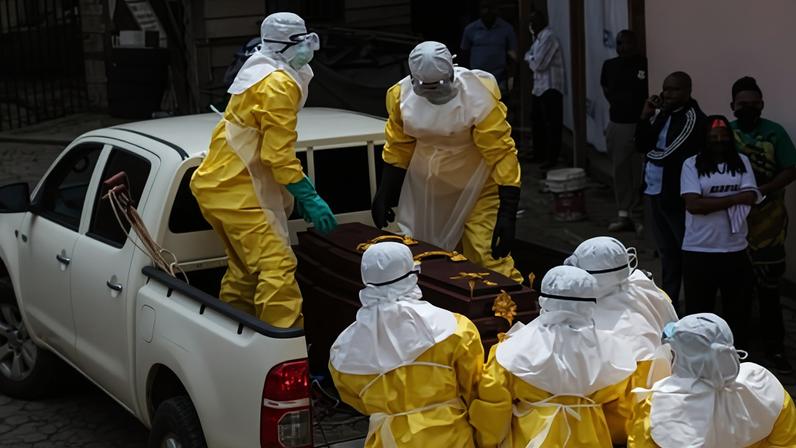 Health workers at the weekend prepare to transport the body of an Ebola victim for a safe burial at a hospital in Bunia, Ituri province, DRC.