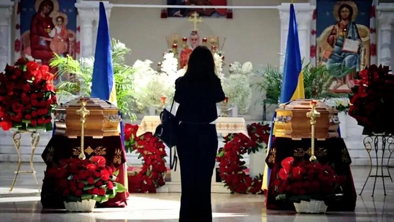 The coffins of Andriy Melnyk and his wife, Sofia Fedak-Melnyk, in Kyiv, Ukraine, on Friday.