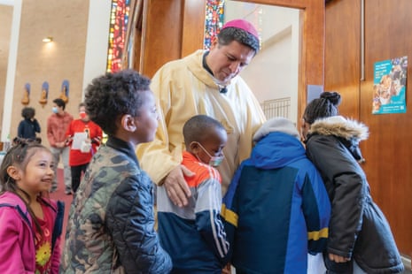 The Right Rev Evelio Menjivar-Ayala with students at St Mary’s School in Landover Hills, Maryland.