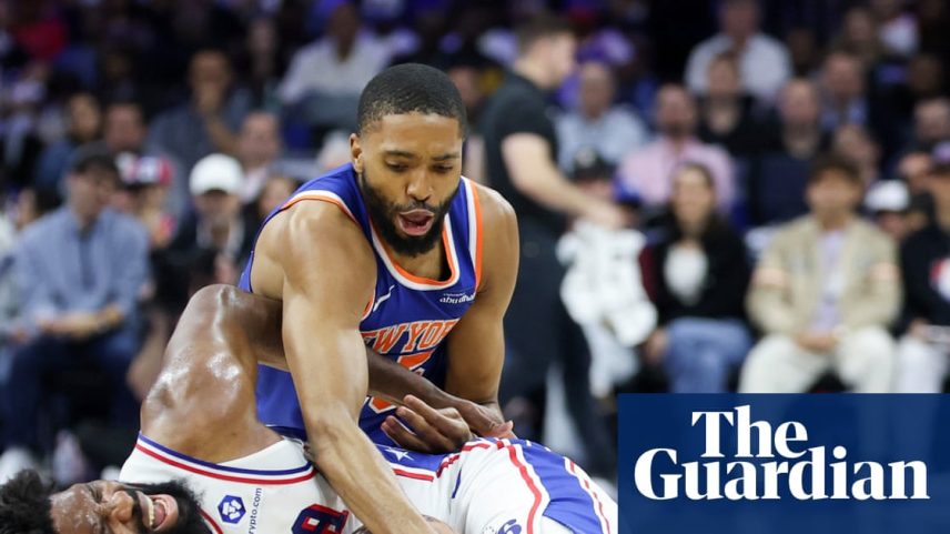 Mikal Bridges and Joel Embiid wrestle for a loose ball during the Knicks’ sweep of the 76ers.