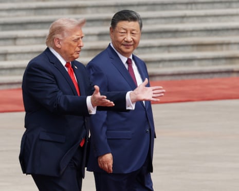 Donald Trump and Xi Jinping attend a welcome ceremony at the Great Hall of the People on 14 May in Beijing.