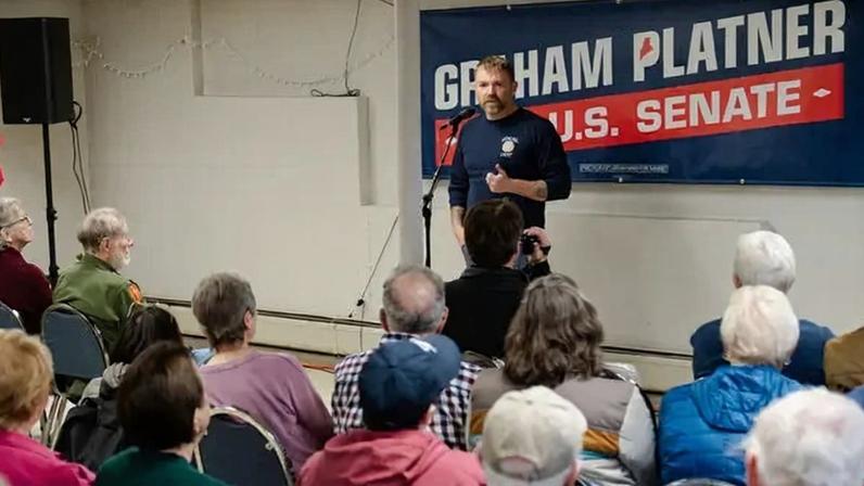 Graham Platner, a candidate for Senate in Maine, speaking at a town hall in Sabattus, Maine, last month.