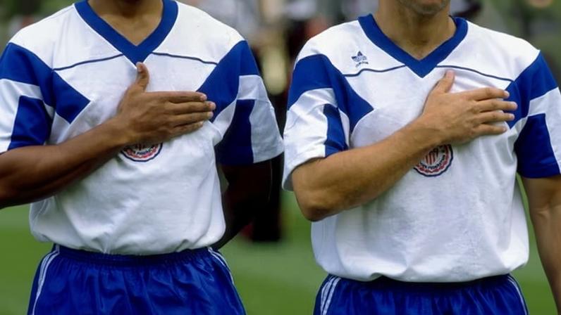 The US team observe the national anthem before the 1990 World Cup match against Czechoslovakia.