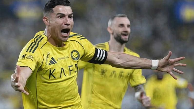 Cristiano Ronaldo wheels away after scoring against Al-Ahli in late April – the Portuguese veteran has 25 league goals this season.