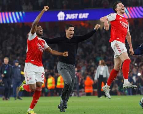 Mikel Arteta and Arsenal players savour the victory.
