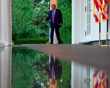Donald Trump arrives to speak at a dinner for members of his administration and law enforcement leaders at the White House on 11 May.