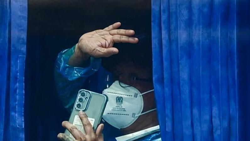 A passenger evacuated from the hantavirus-stricken cruise ship MV Hondius in Tenerife, Spain, 10 May 2026.