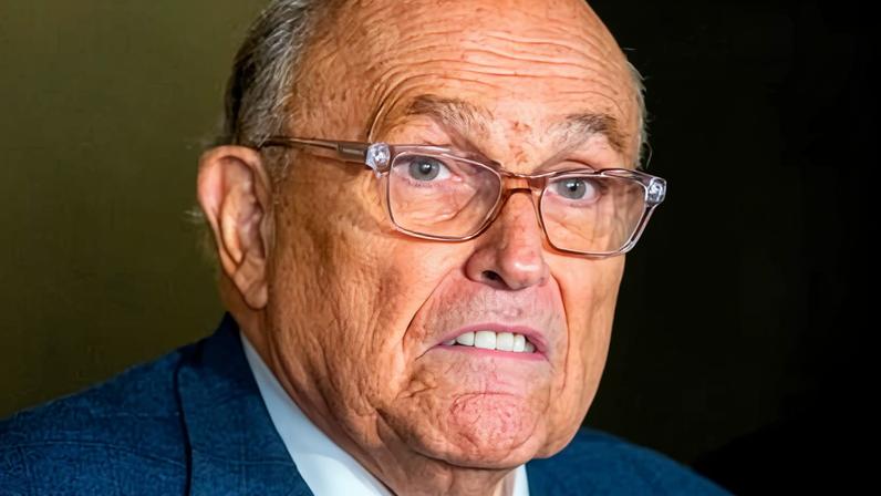 Rudy Giuliani speaks to the media outside Manhattan federal court in New York on 3 January 2025.