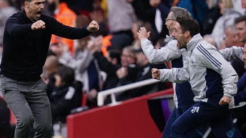 Mikel Arteta celebrates wildly after Arsenal’s third goal
