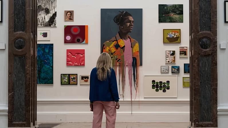 A visitor to the 2020 summer exhibition at the Royal Academy, London.