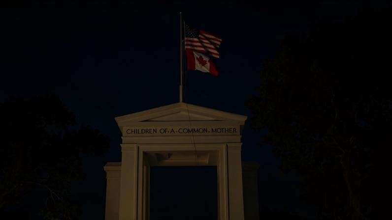 The US and Canadian flags fly near the Bluewater Bridge border crossing between Sarnia, Ontario, and Port Huron, Michigan