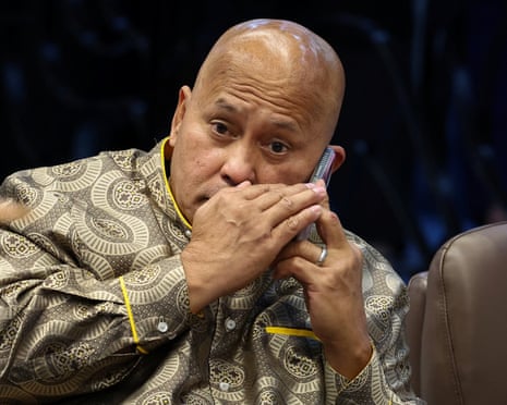 Dela Rosa had called for his supporters to gather in front of the senate, saying: ‘Let us not allow another Filipino to be taken to The Hague.’ Photograph: Eloisa Lopez/Reuters