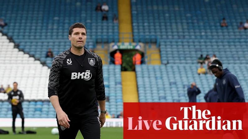 Burnley interim manager Michael Jackson leads the warm-ups at Elland Road.