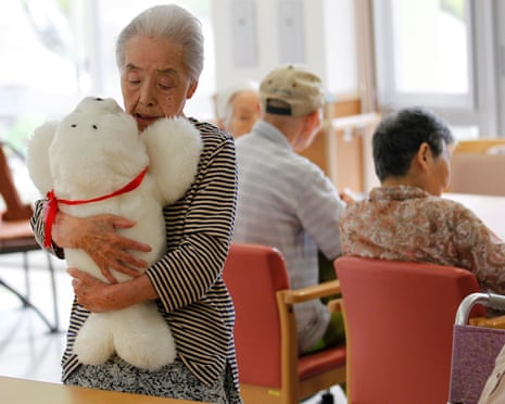A care home in Japan using a therapeutic robot pet seal. ‘But I was more impressed by some of the low-tech solutions.’