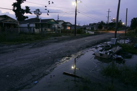 A streetlight illuminates an abandoned street in the Lower Ninth Ward of New Orleans on 19 August 2006.